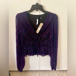 NWT!! Small multi colored blouse. Perfect condition and never been worn